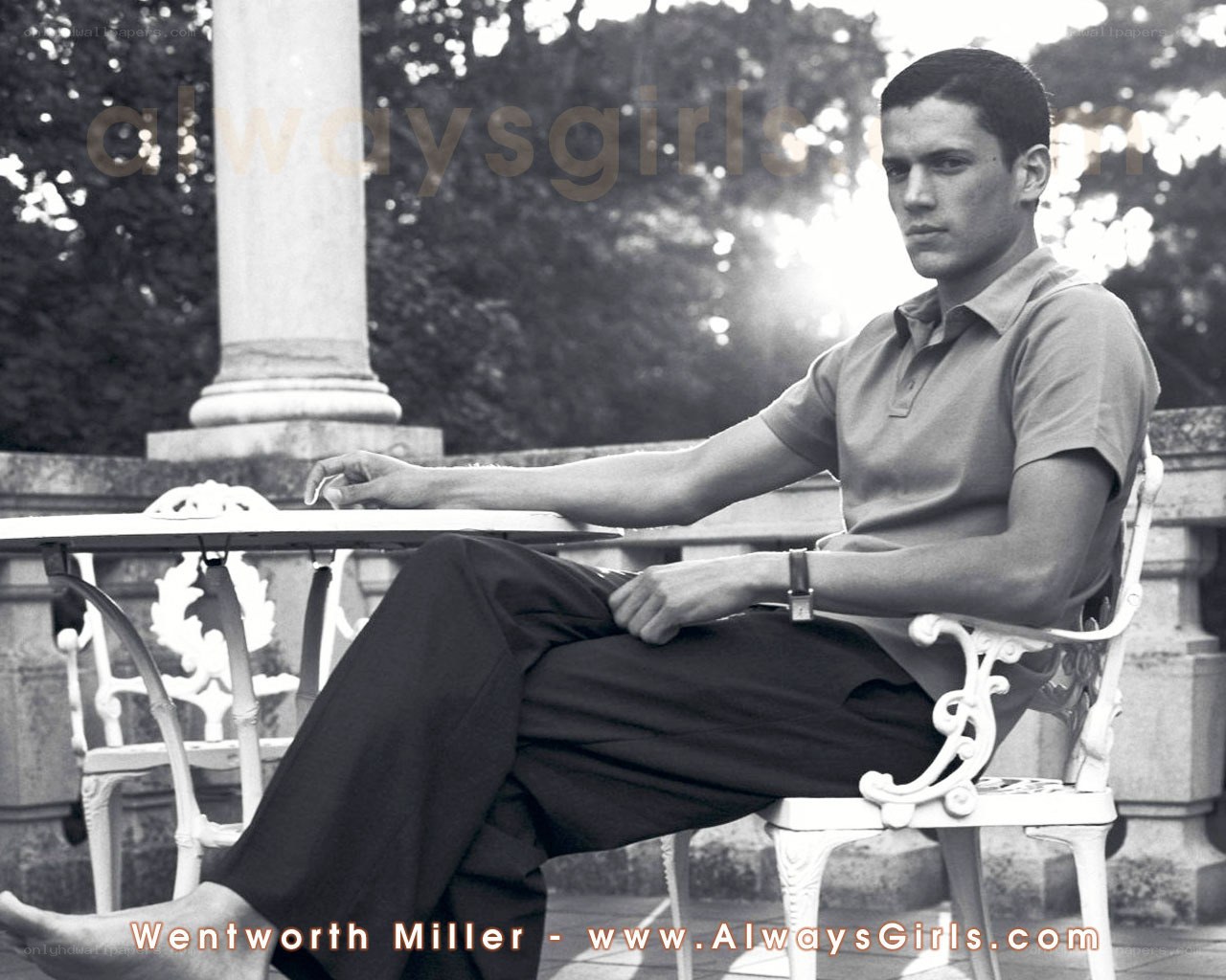 Man sitting at a table outdoors