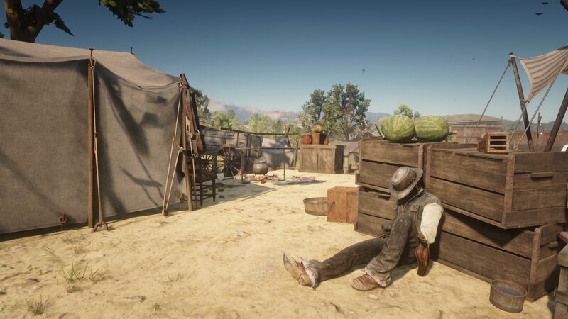 Man Sitting by Crates