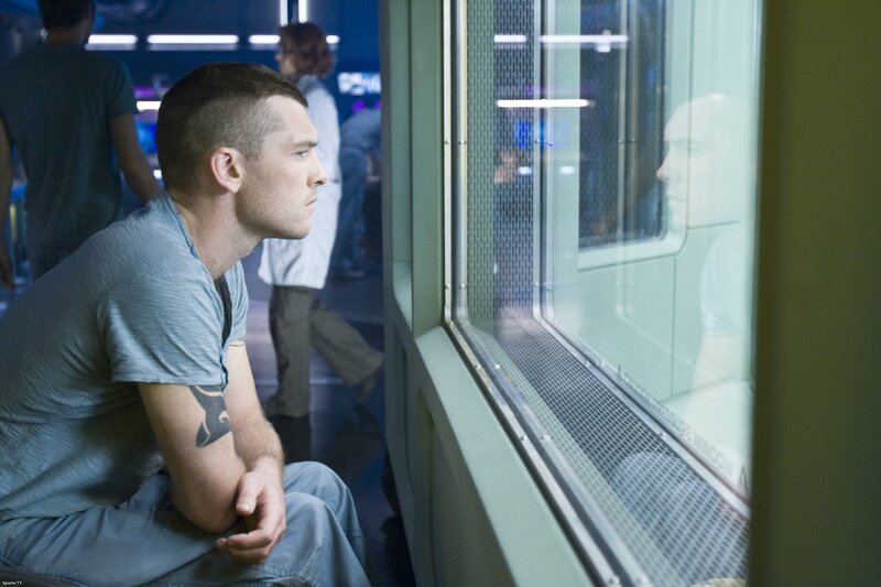 man sitting by window