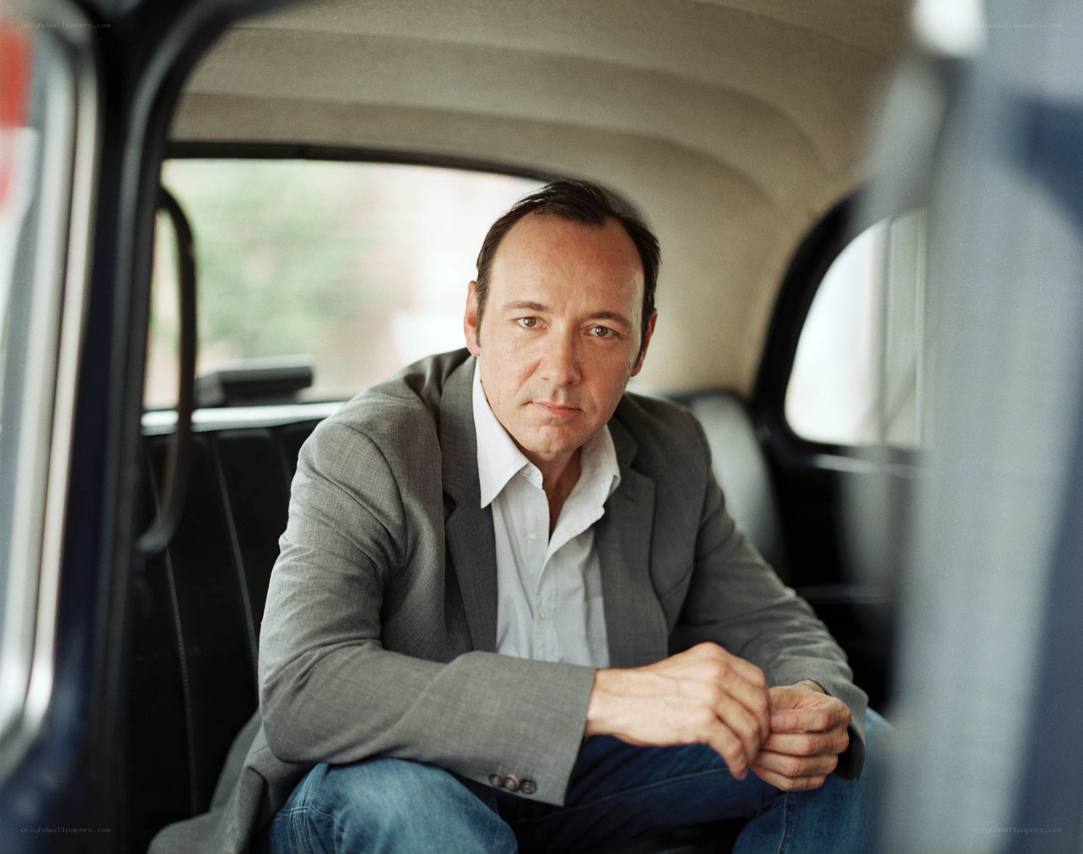 man sitting in a car