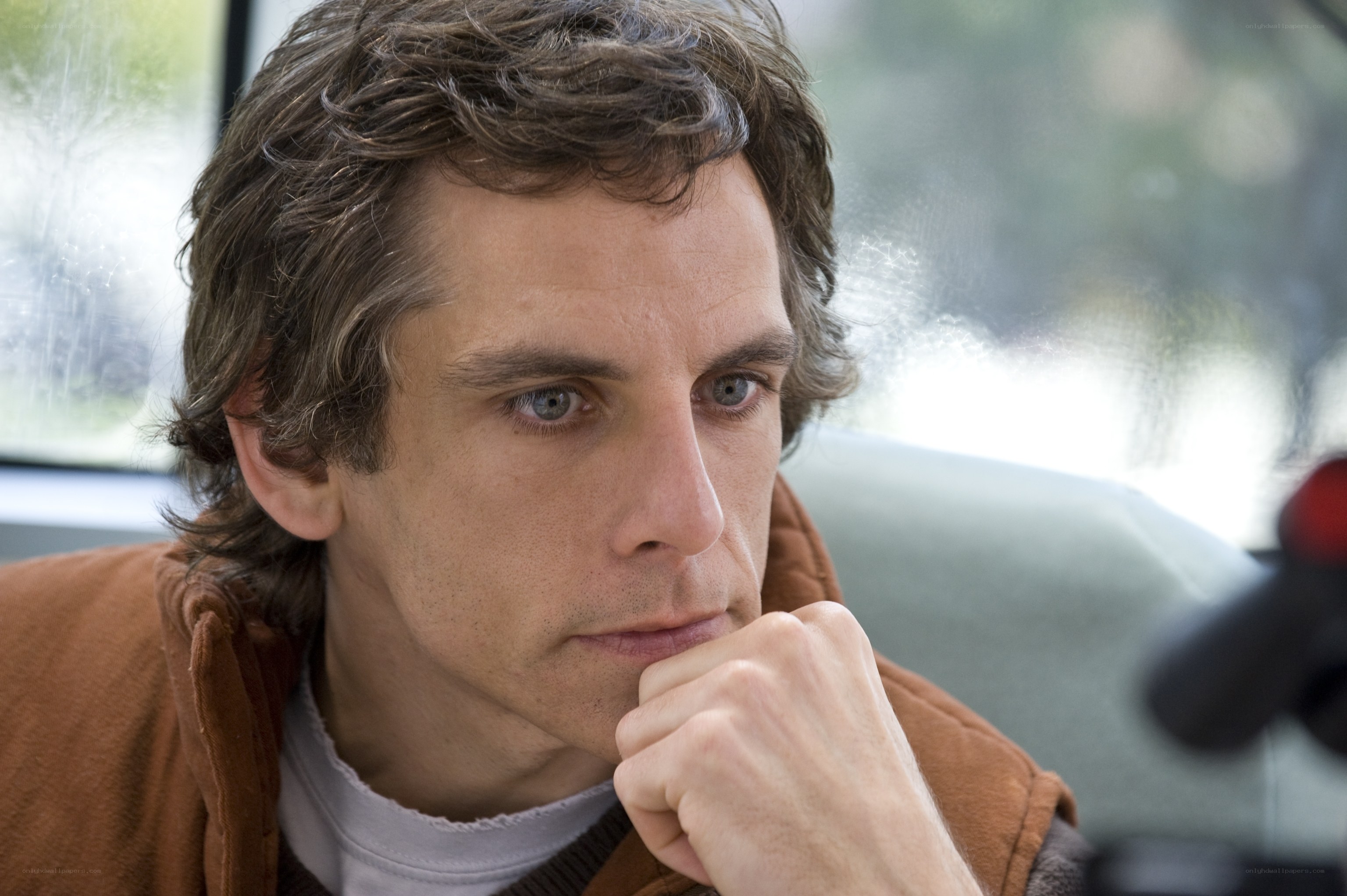 man sitting in a car