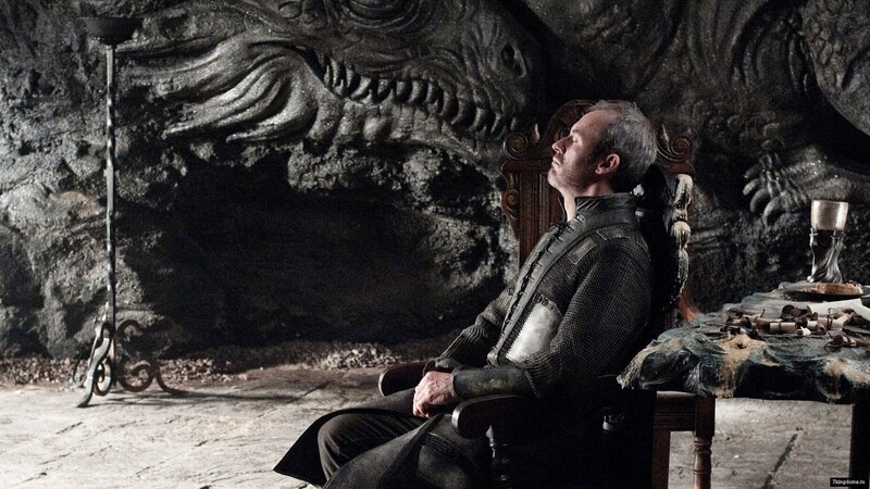 man sitting in a dragon cave