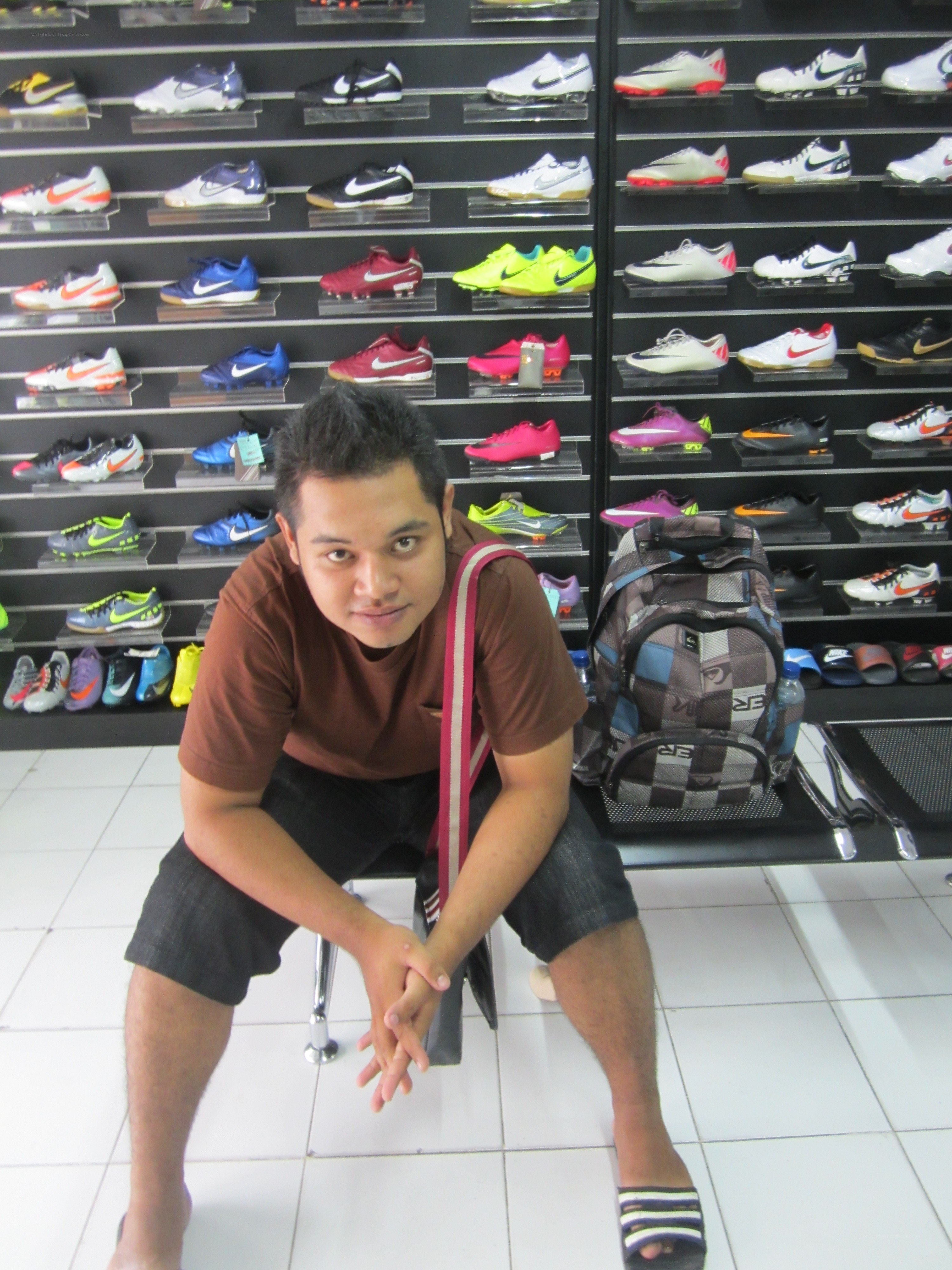 Man sitting in a shoe store