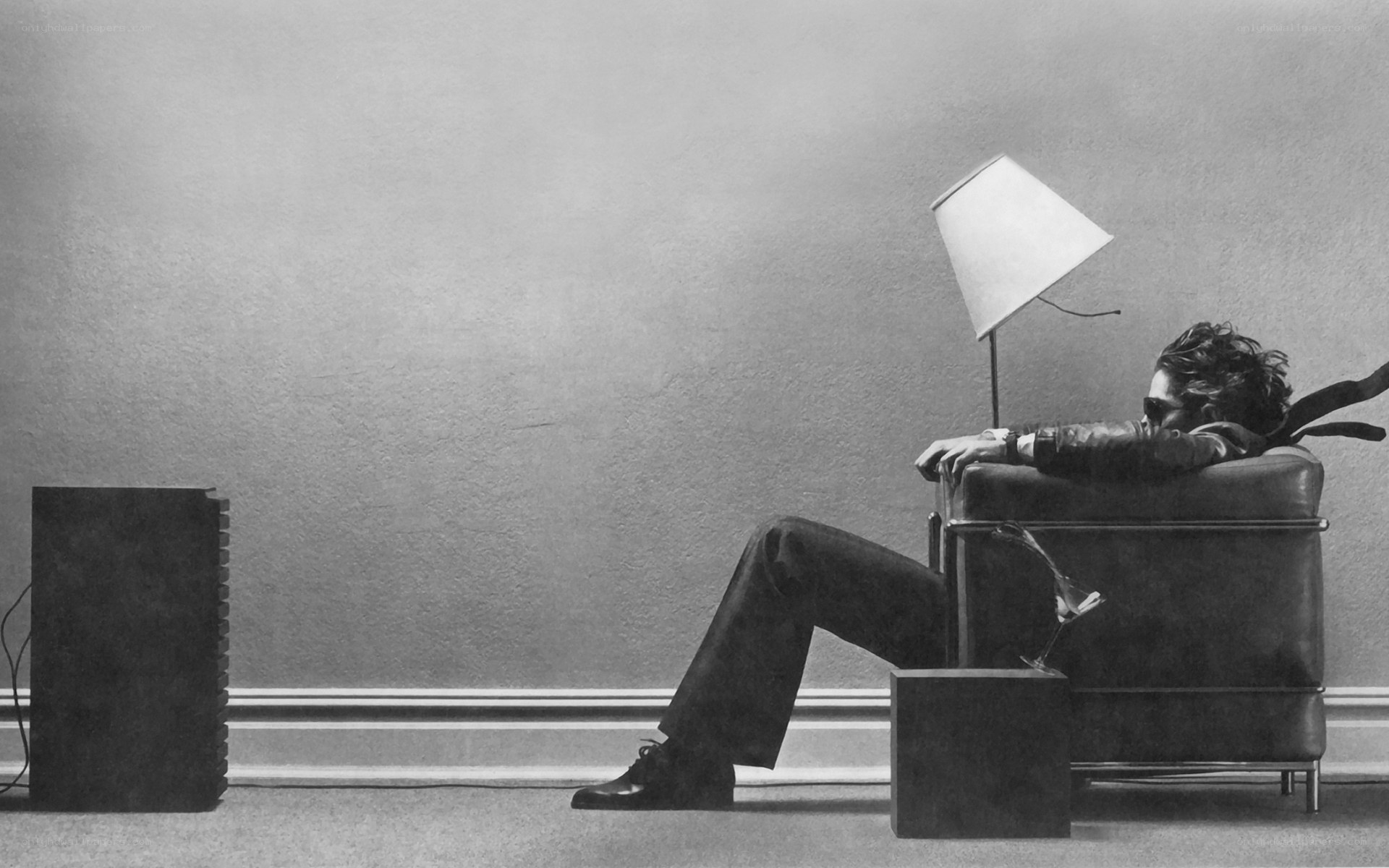 man sitting in armchair