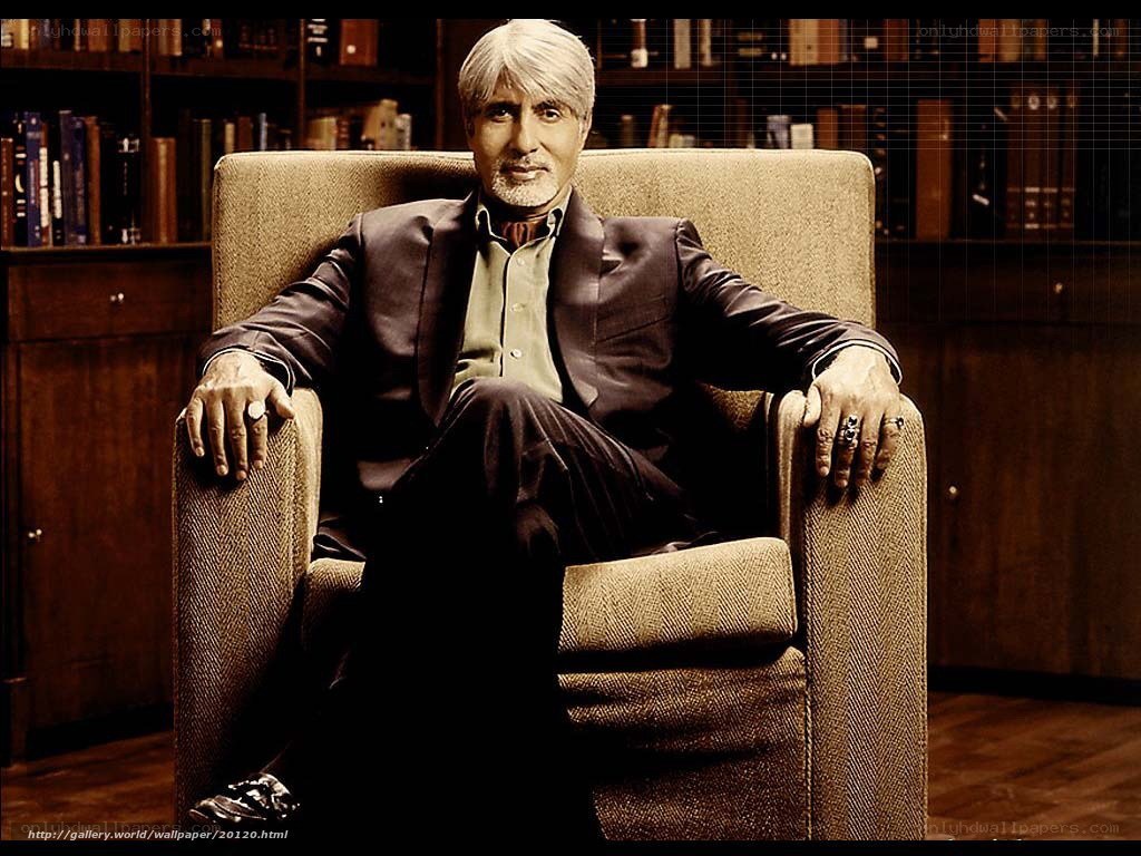 man sitting in armchair
