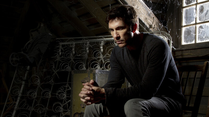 man sitting in attic