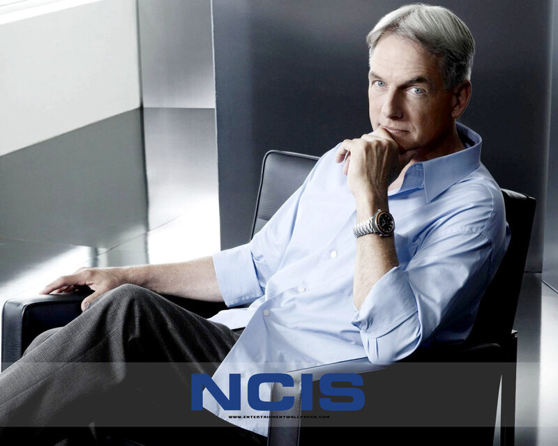 Man Sitting in Chair — Blue, Serious