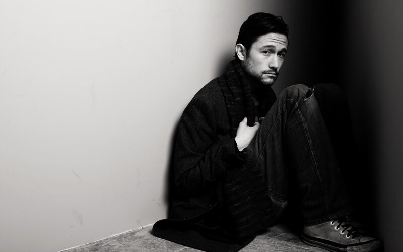 Man Sitting in Corner