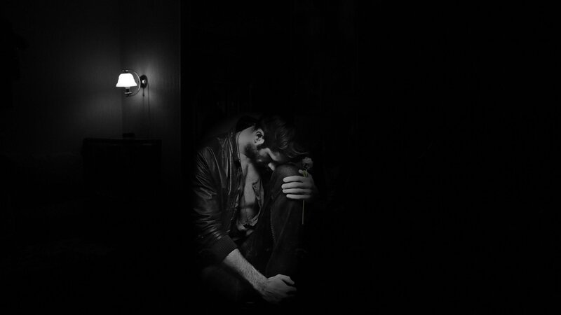 Man Sitting in Dark Room — Black, Dramatic