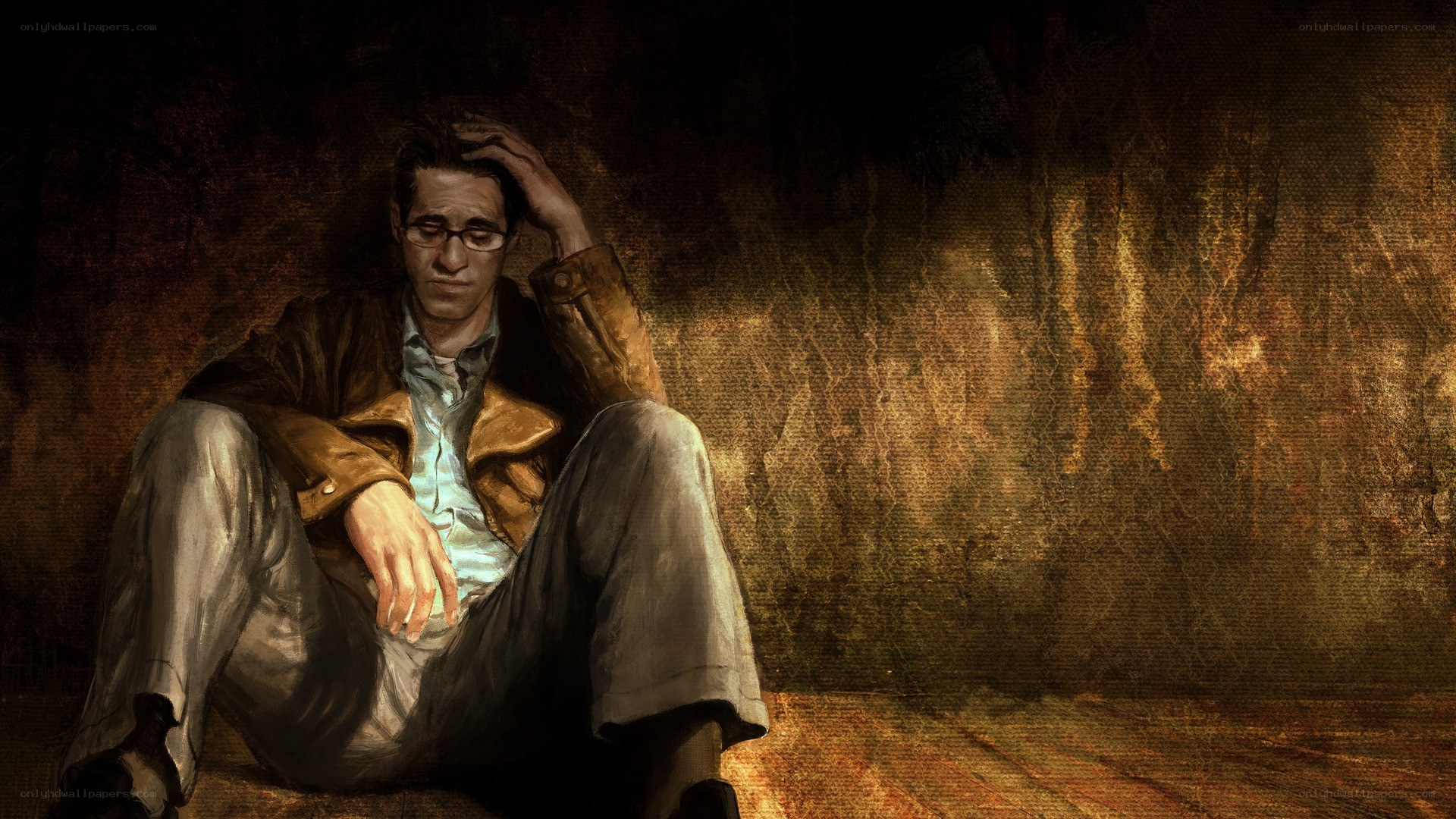 man sitting in dim light