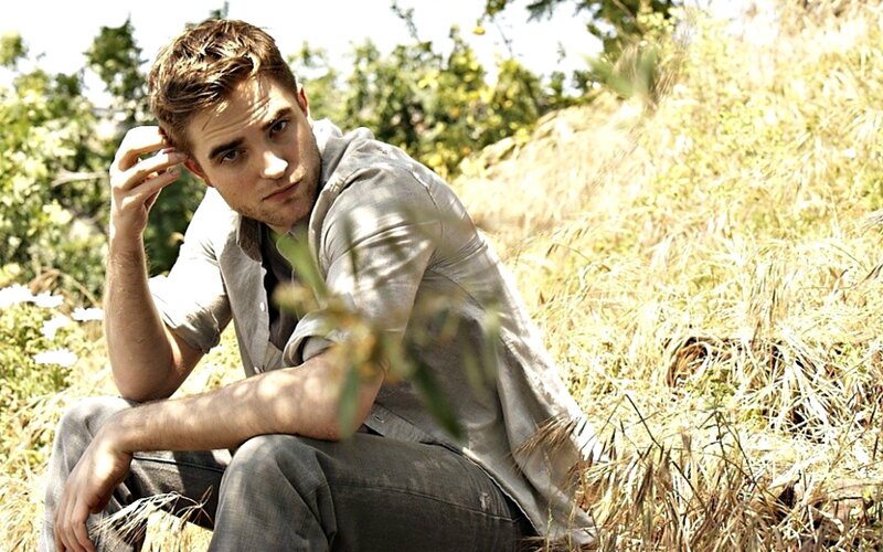 Man Sitting in Field