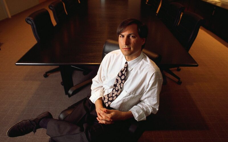 Man Sitting in Office Chair — White