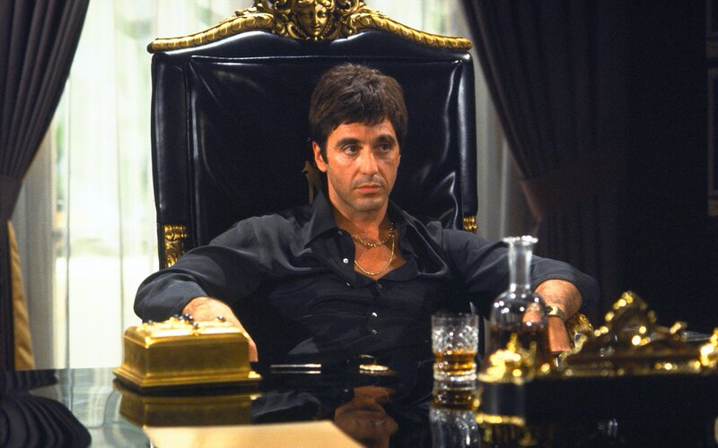Man Sitting in Ornate Chair — Black
