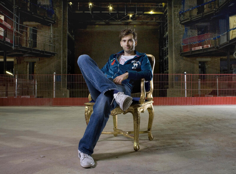 Man sitting in ornate chair