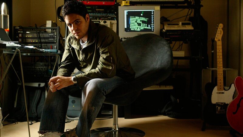 Man Sitting in Studio