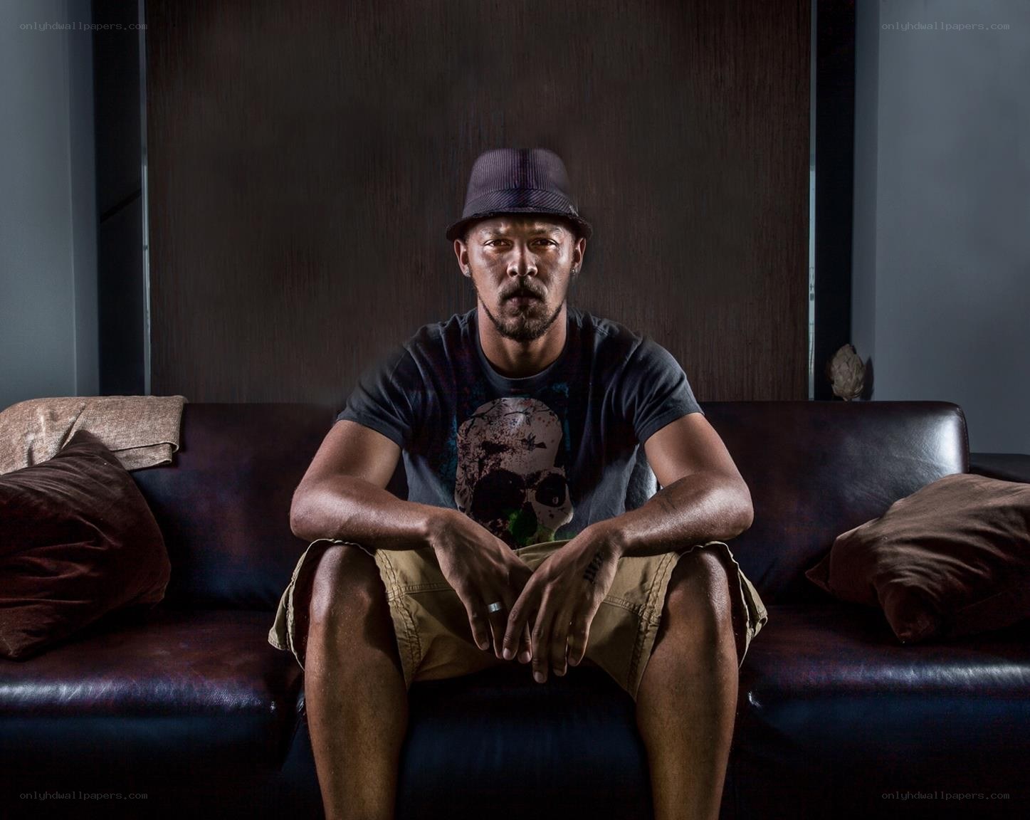 man sitting on a couch