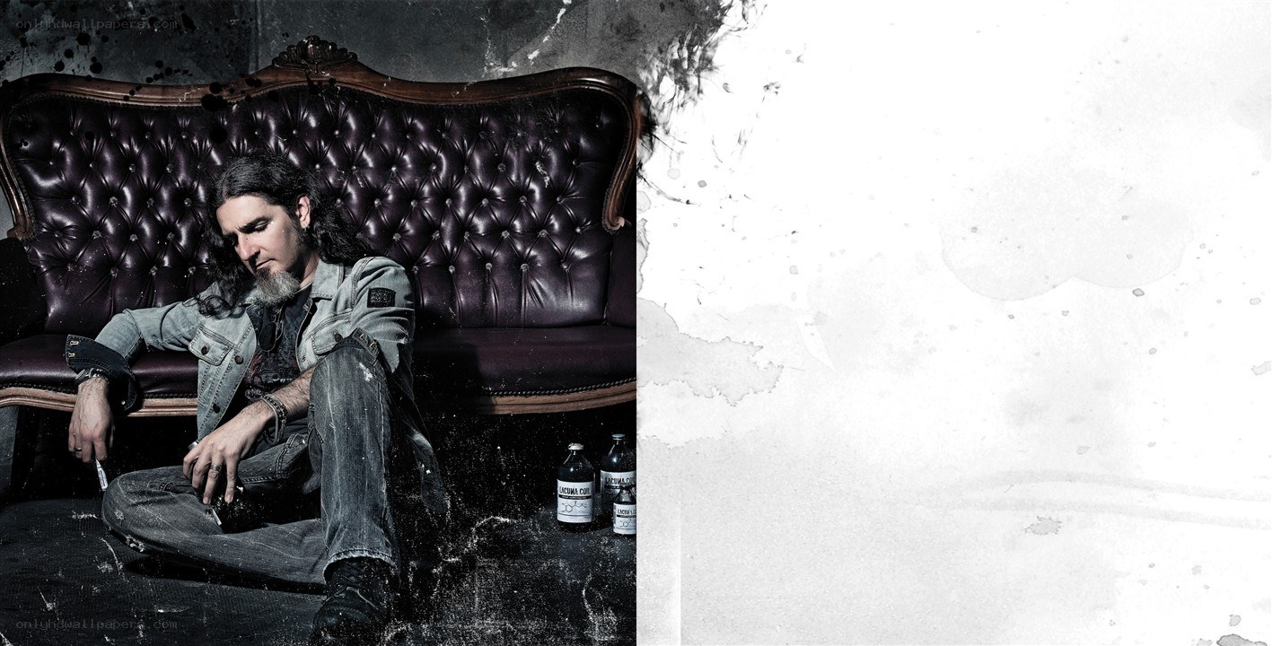 man sitting on a leather couch