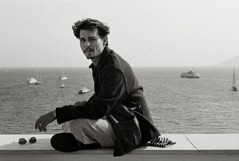 Man Sitting on a Ledge — Black