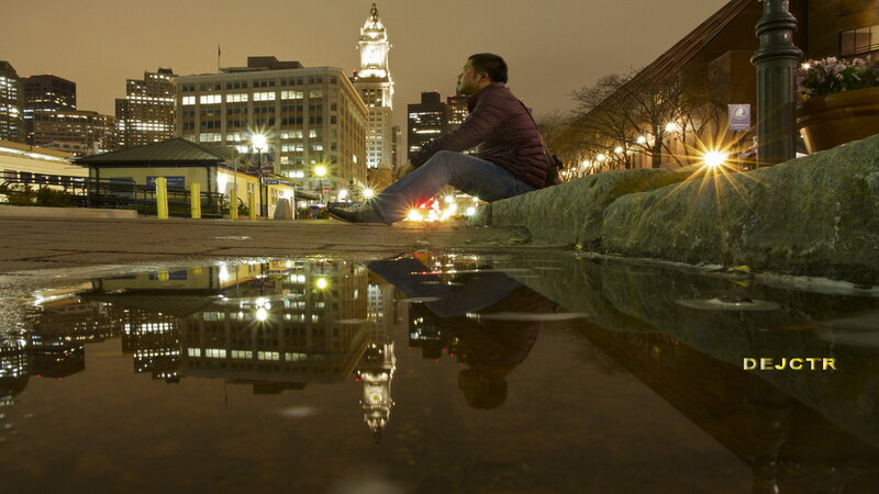 Man Sitting on a Ledge