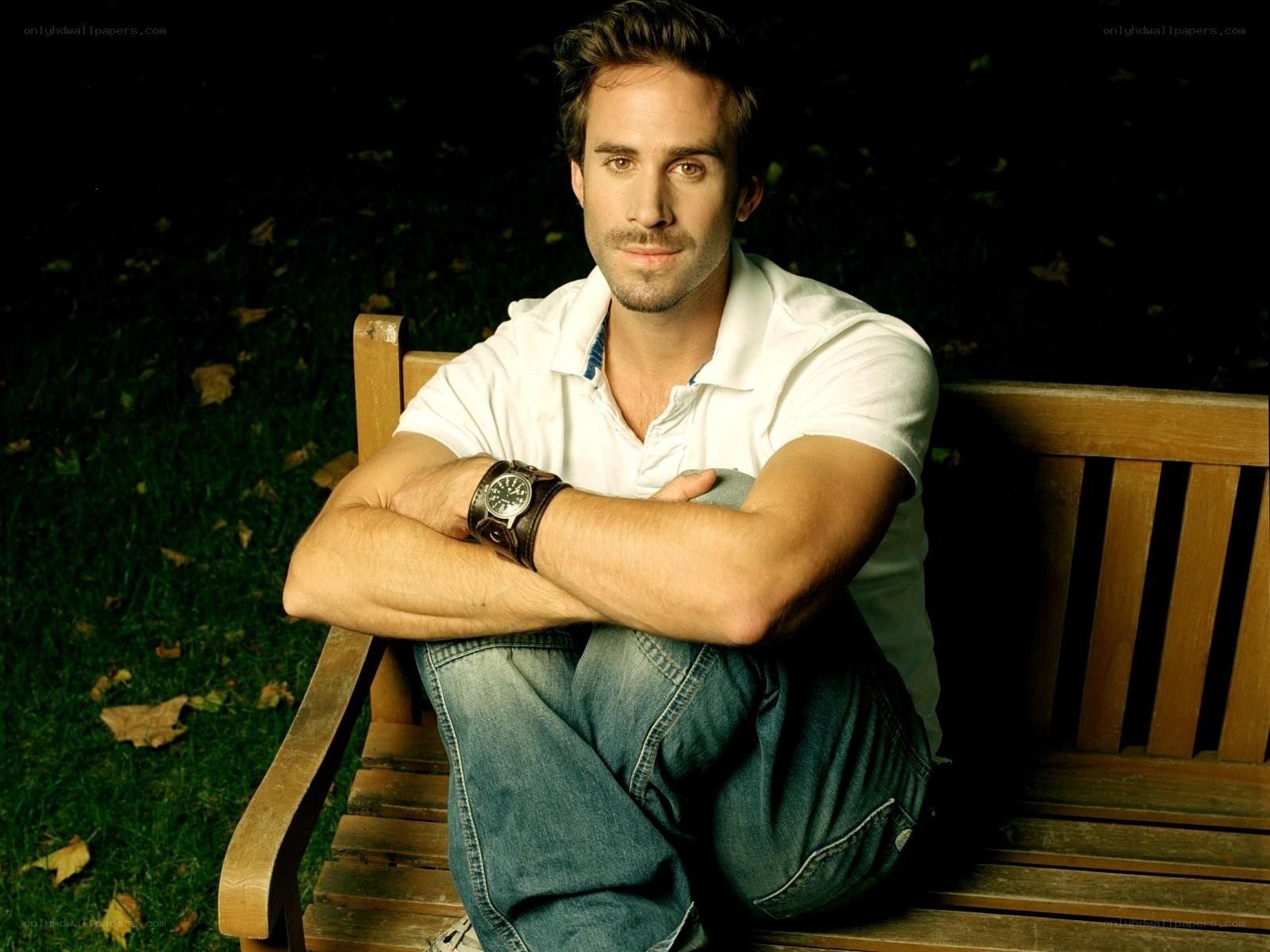 man sitting on a park bench