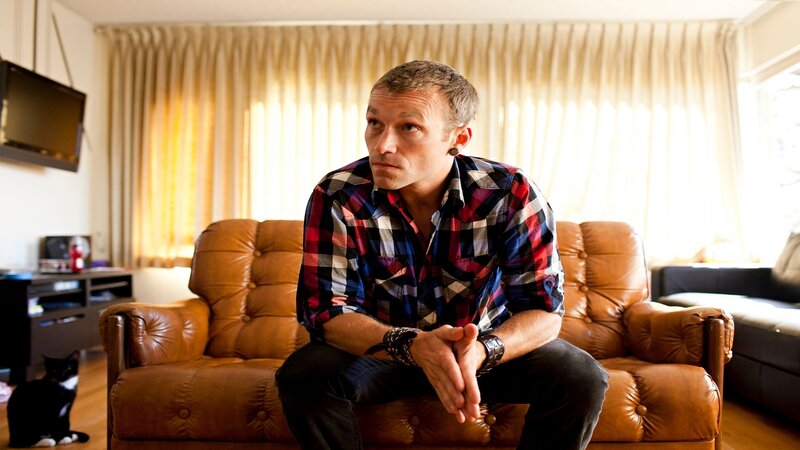 Man sitting on a sofa
