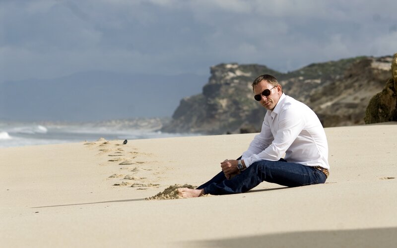 Man Sitting on Beach — Beige, Calm