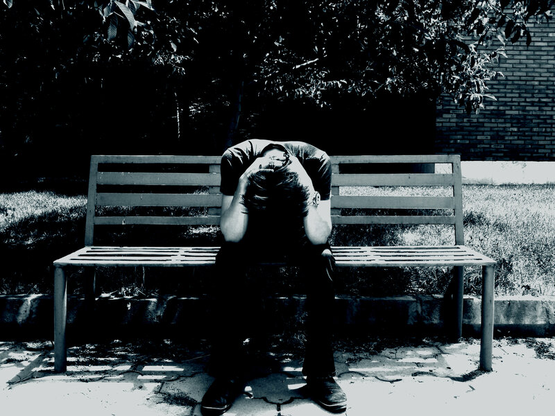 Man Sitting on Bench — Black, Somber