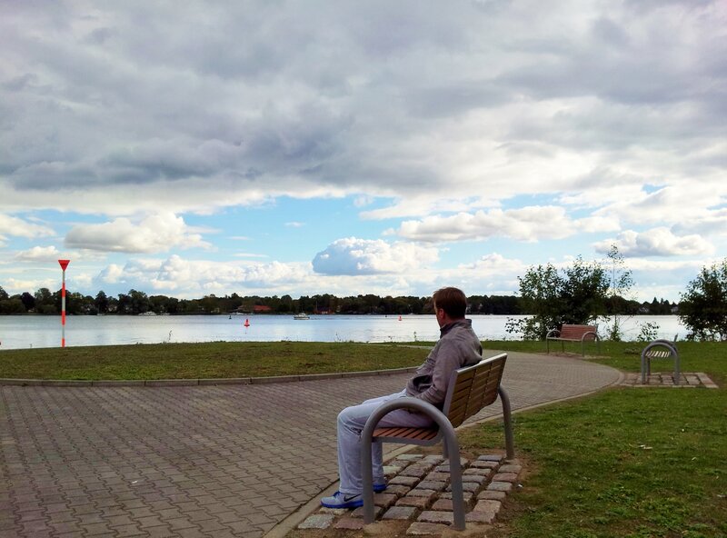 Man Sitting on Bench — Gray, Calm