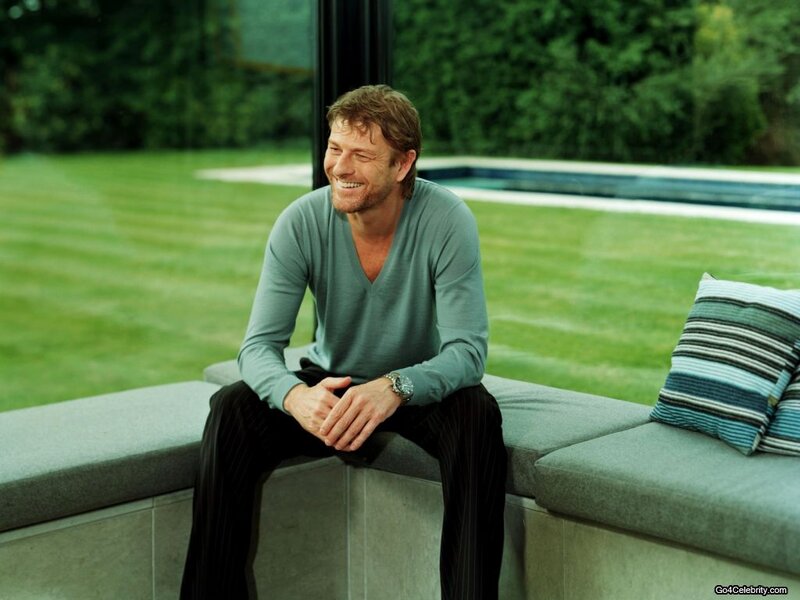 Man Sitting on Bench — Green, Relaxed