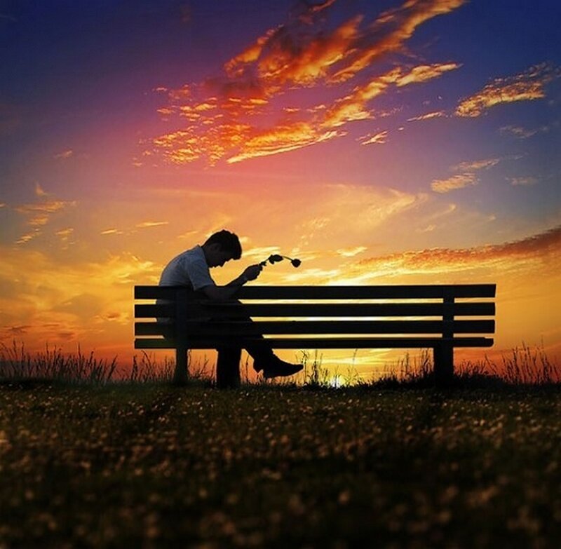 Man Sitting on Bench — Orange