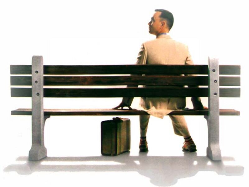 Man Sitting on Bench — White, Contemplative, Photograph, Suitcase, Coat