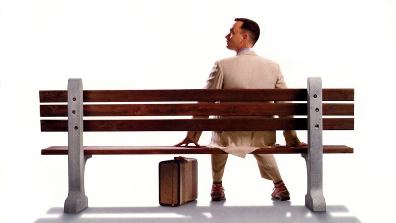 Man Sitting on Bench — White, Contemplative