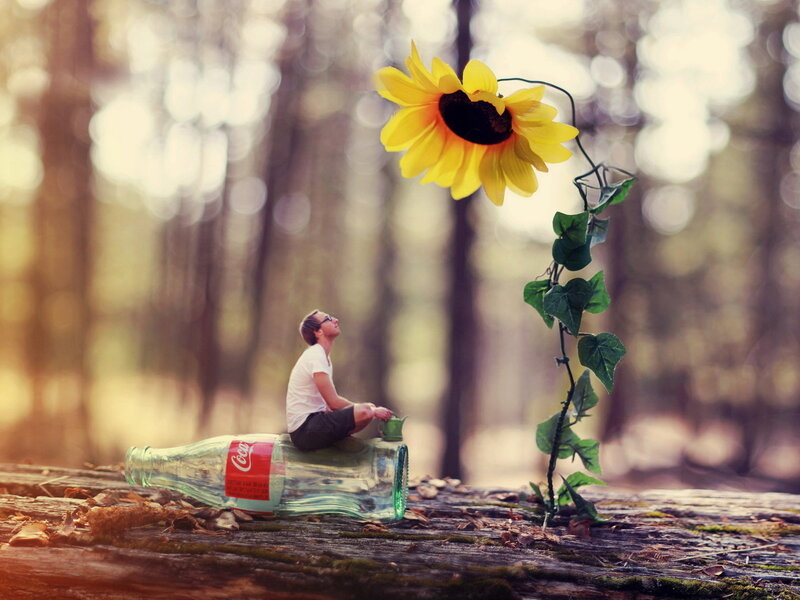 Man Sitting on Bottle