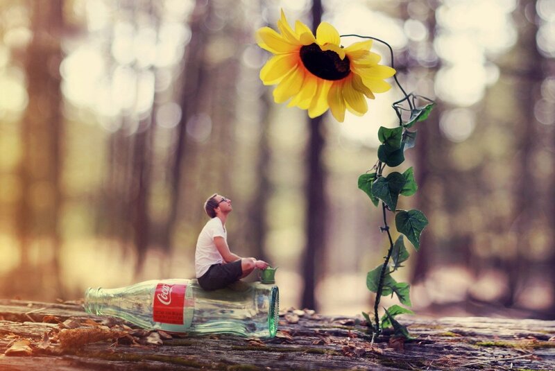 Man Sitting on Bottle — Yellow, Serene, Afternoon