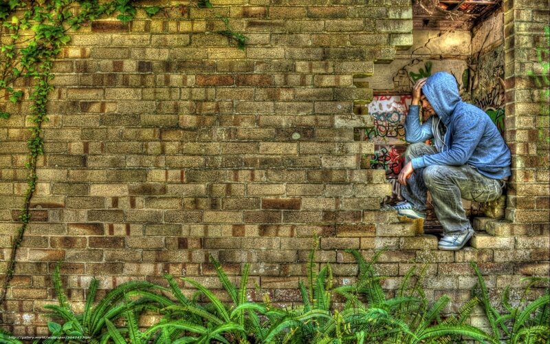 Man sitting on brick steps