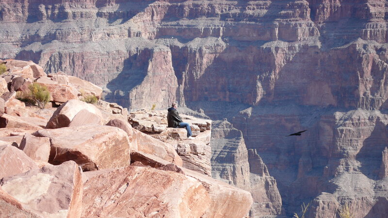 Man Sitting on Canyon Edge