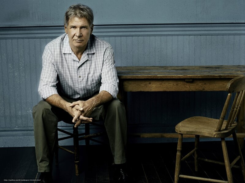 Man Sitting on Chair — Blue, Serious