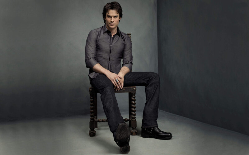 Man Sitting on Chair — Gray, Serious