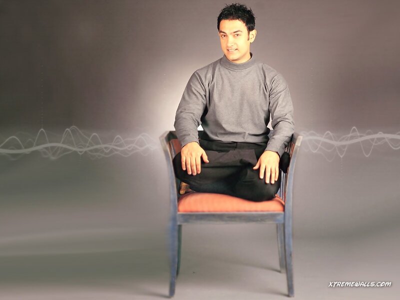 Man Sitting on Chair — Gray