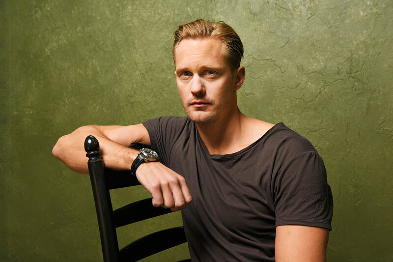 Man Sitting on Chair — Green, Serious