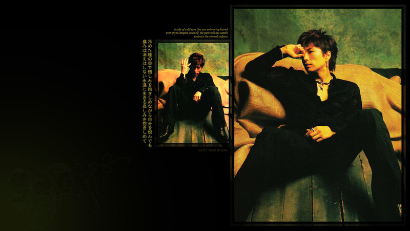 Man Sitting on Couch — Black, Dramatic, Photograph