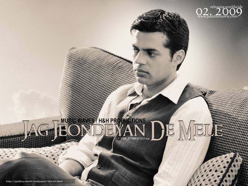 Man Sitting on Couch — Black, Serious