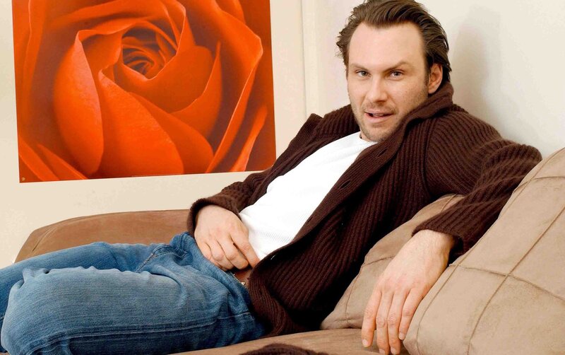 Man Sitting on Couch — Brown, Relaxed