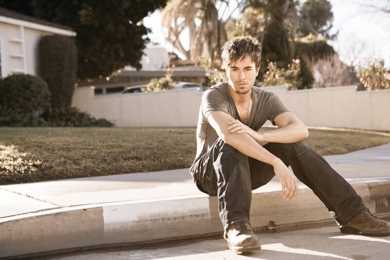 Man Sitting on Curb — Brown