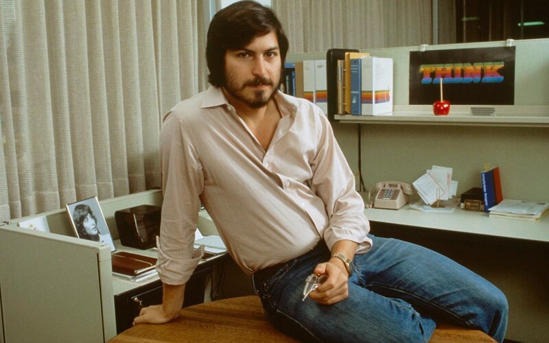 Man Sitting on Desk — Beige