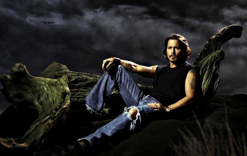 Man Sitting on Driftwood — Black