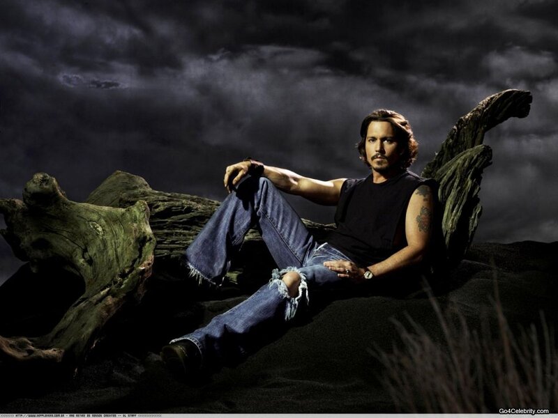 Man Sitting on Driftwood