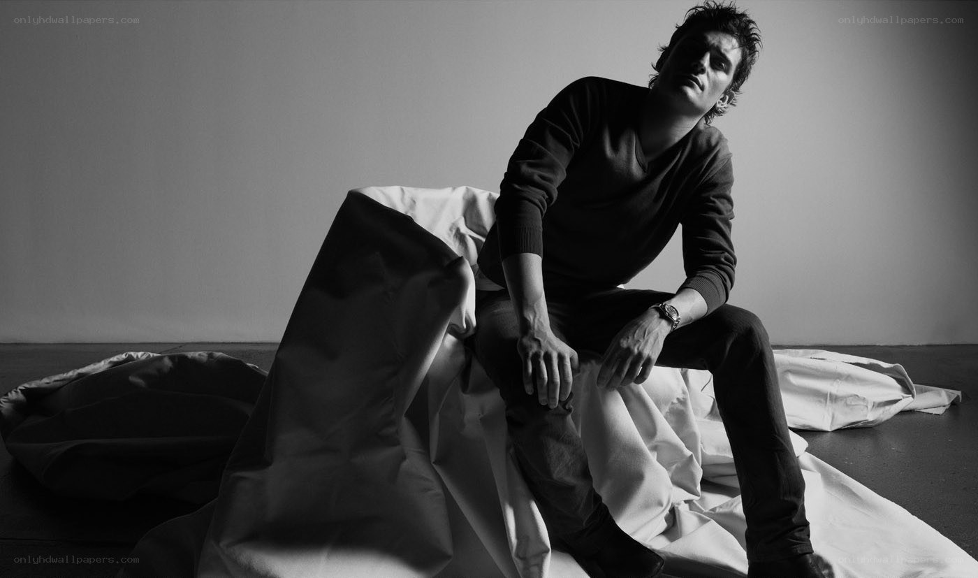 man sitting on fabric