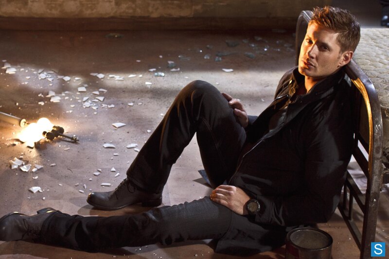 Man Sitting on Floor — Black