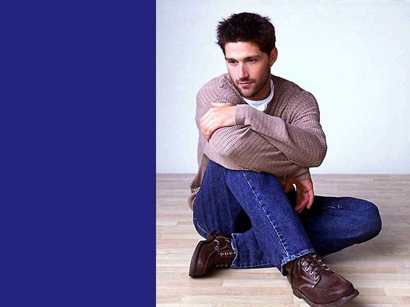 Man Sitting on Floor — Blue